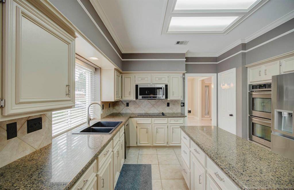 Expansive kitchen perfect for culinary creativity and meal preparation.