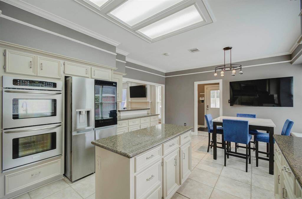 Abundant cabinet space for all your storage needs in this kitchen.
