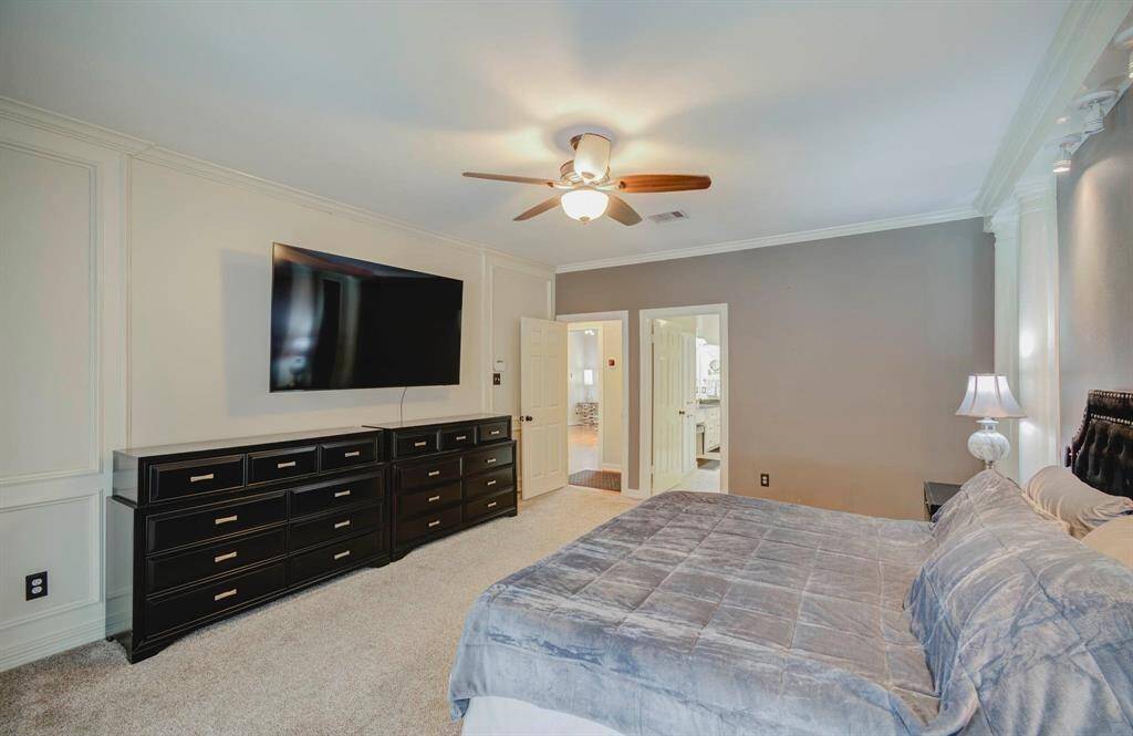 Luxurious primary suite with a private en-suite bathroom.