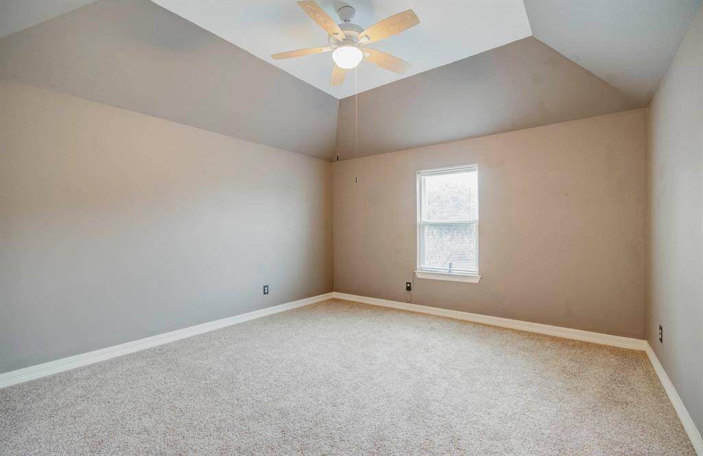 Spacious fourth bedroom, perfect for all your furniture needs.