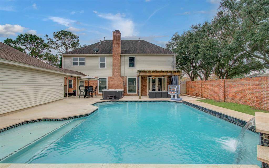 Experience endless summer enjoyment in your private backyard oasis.