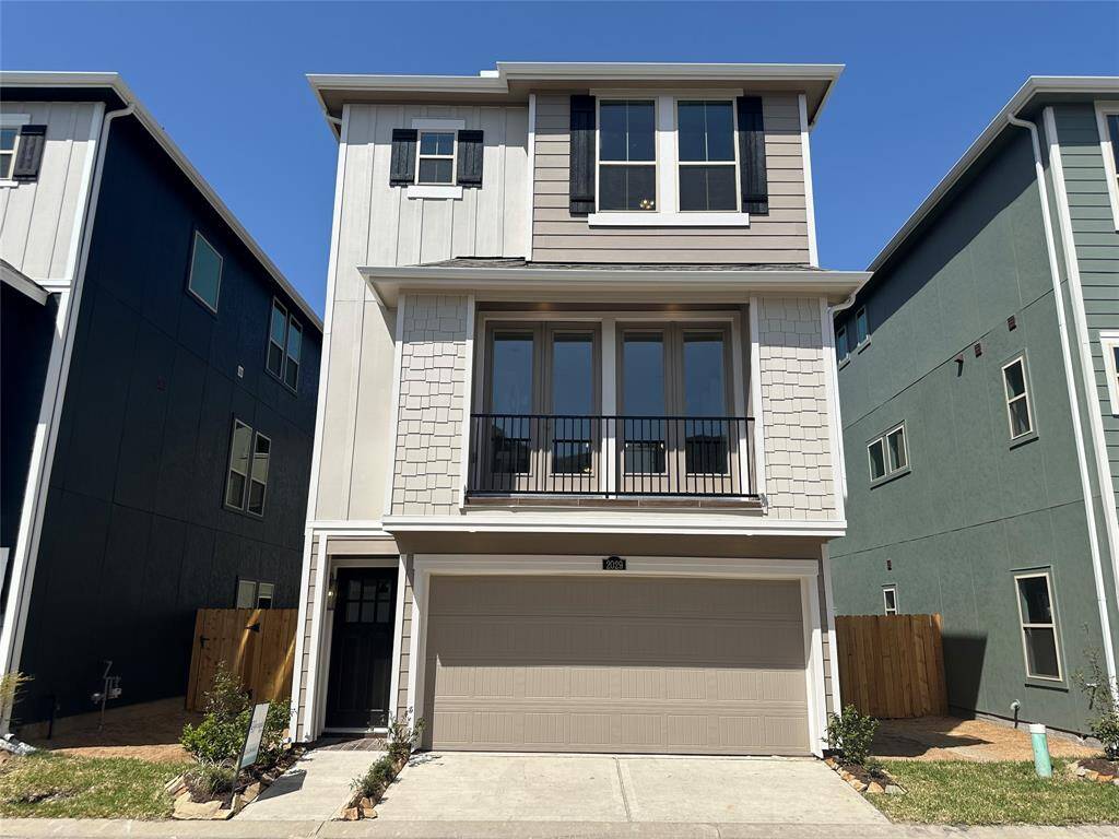 Three-story home with 3 bedrooms, 3.5 baths and 2 car garage