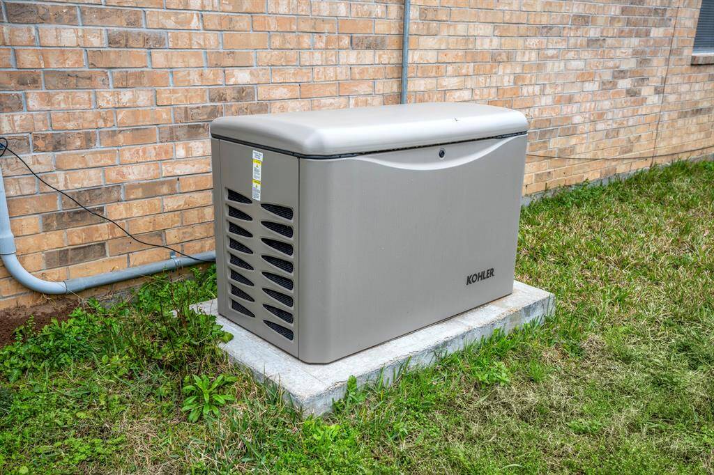 A generator, offering added convenience and peace of mind, ensuring you're prepared for power outages and maintaining comfort in the home during unexpected events.
