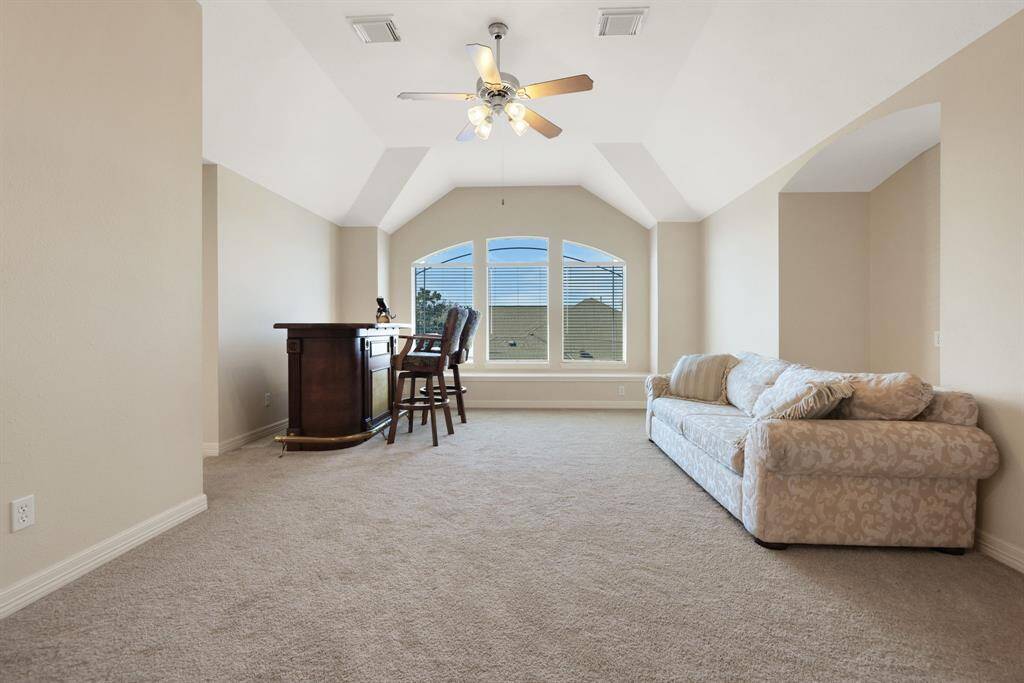Secondary bedrooms offer walk in closets