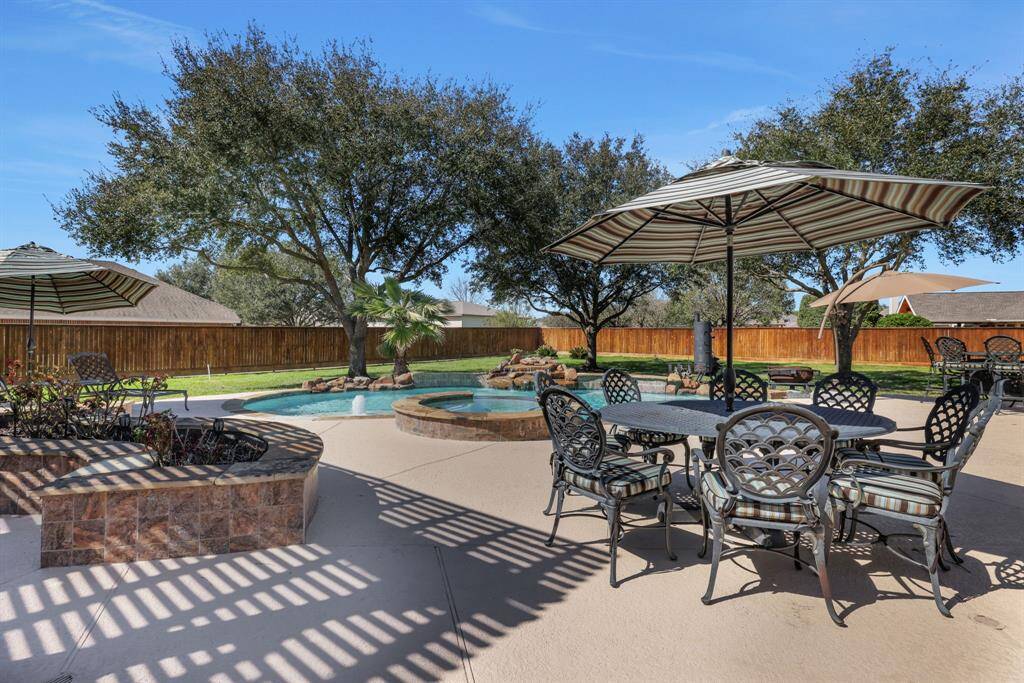 Pergola is beautiful and offers a ceiling fan for those hot summer days