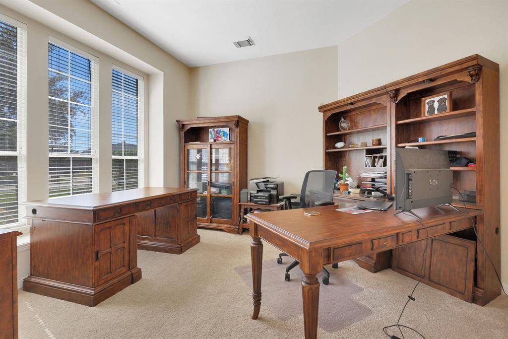 Formal dining room with crown molding and chandelier for your holiday meals