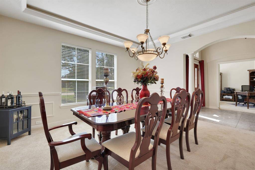 Formal dining room has direct access to the kitchen