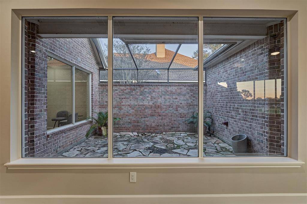 This is one of the screened-in porches. This space is ready for your creativity! Imagine a water feature surrounded with your favorite flowers or better yet...an herb garden. The possibilities are endless!