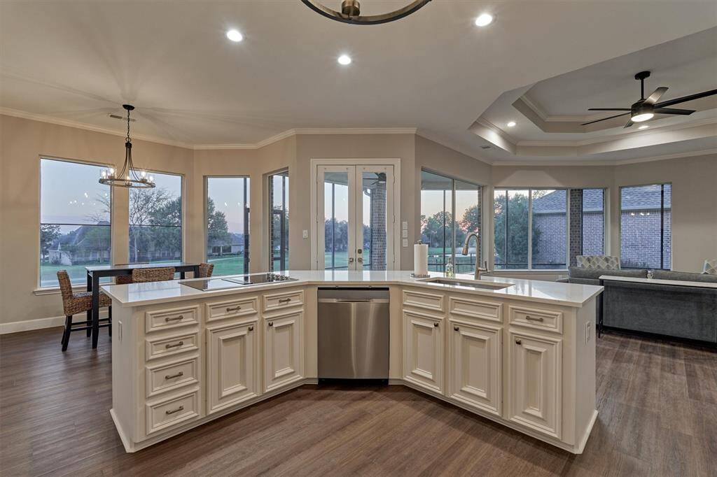 The center island enjoys opens views of the family room and breakfast area thus allowing uninterrupted conversations while entertaining.