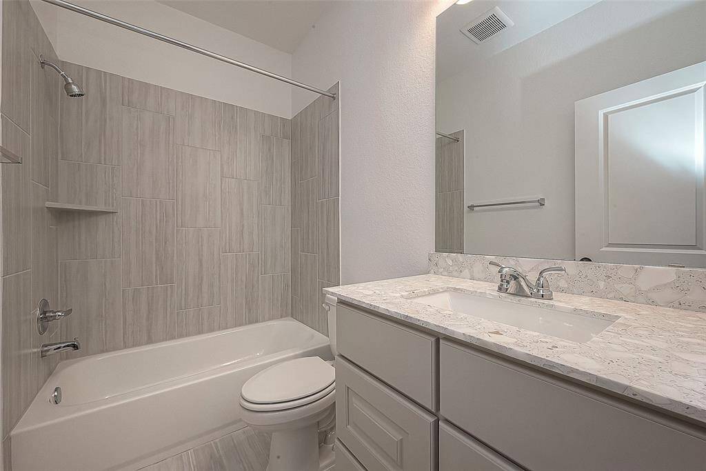 2nd Upstairs Full bathroom:  J&J bath connecting 2 of the bedrooms.