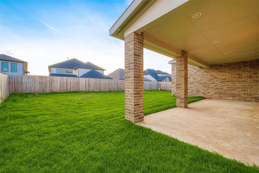 Additional features include prewired alarm for added security, ceiling fans for comfort, and smart home capabilities for modern convenience. Security camera wiring in place front side along with 7 sound system wiring in family room, media room and patio.