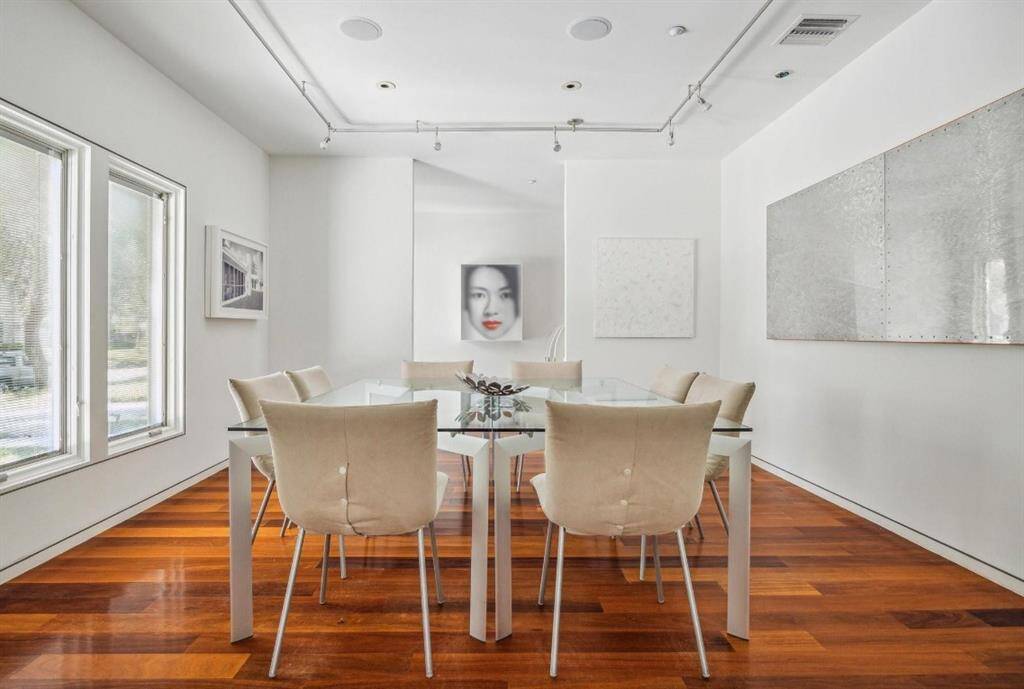 Enjoy meals in a dining room that offers a picturesque view of the front yard.