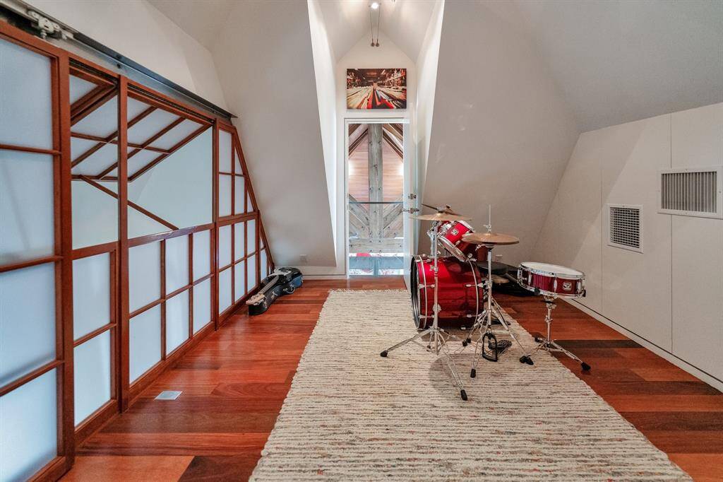 The loft above bedroom #2 features a walk out balcony over the movie/game room.