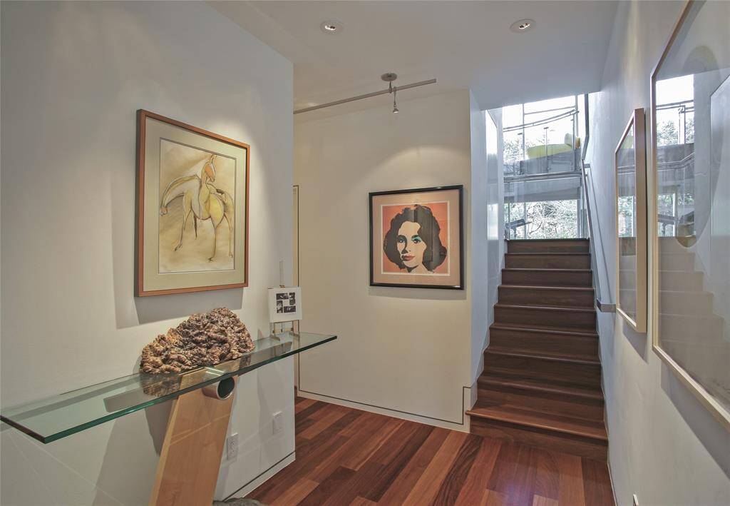 This is your view as you enter the front door. The dining room is on the left and the formal living room is on the right.