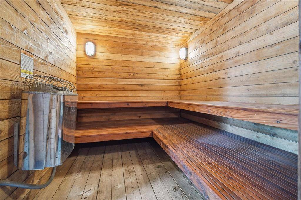 Inviting sauna in the bath tower, with access to a full bathroom with both an indoor and outdoor  shower.