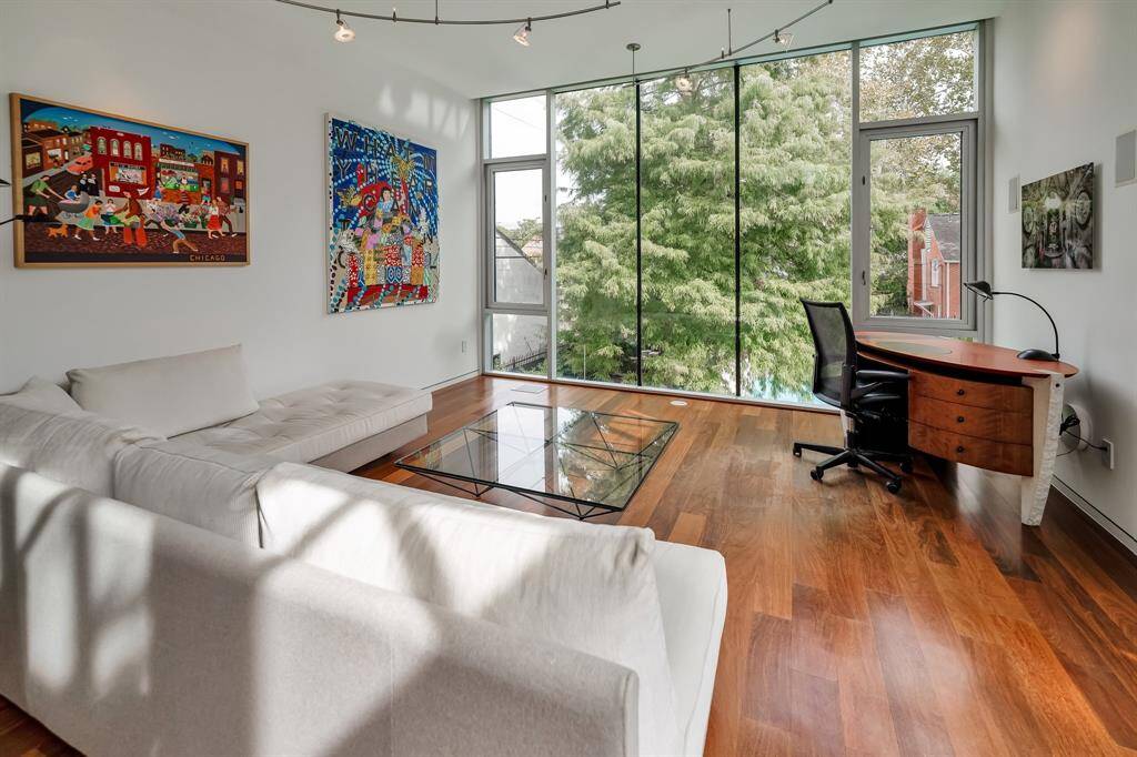 The guest house overlooks the pool and has a full bathroom and walk-in closet upstairs.