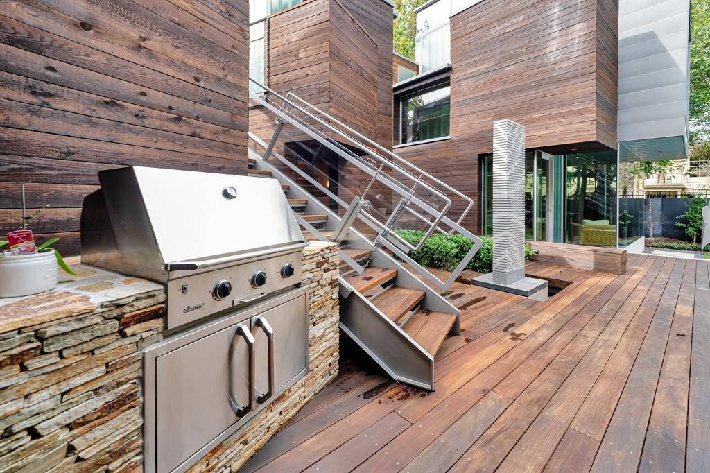 Embrace the art of al fresco cooking in this thoughtfully crafted space. This home was designed with entertaining in mind.