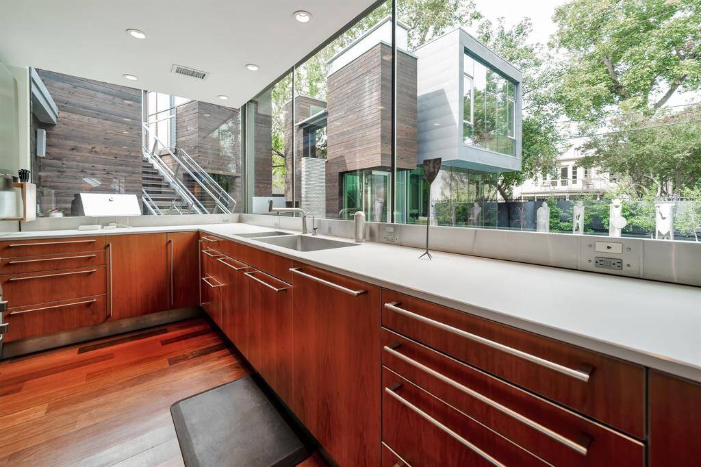 In addition to the Sub Zero, there are additional refrigeration and freezer drawers + a wine cooler and ice maker- all seamlessly built in.