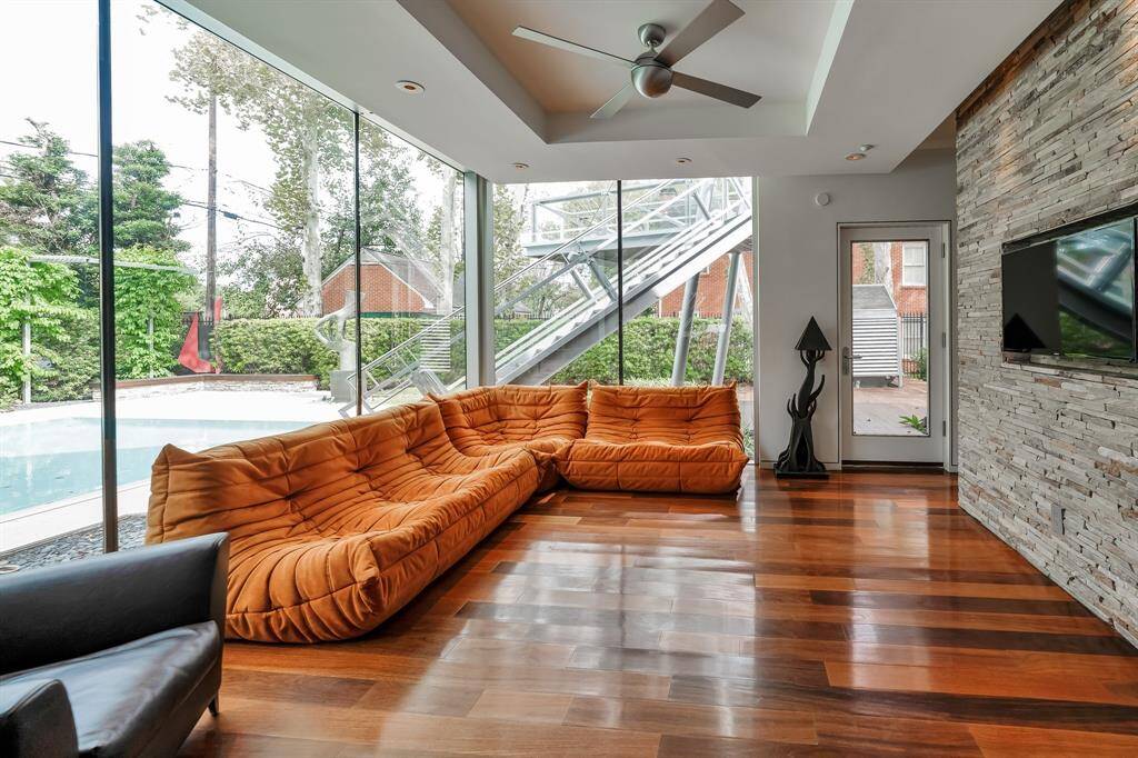 Downstairs den offers an unobstructed view of the backyard and a great place to enjoy your favorite show or game.