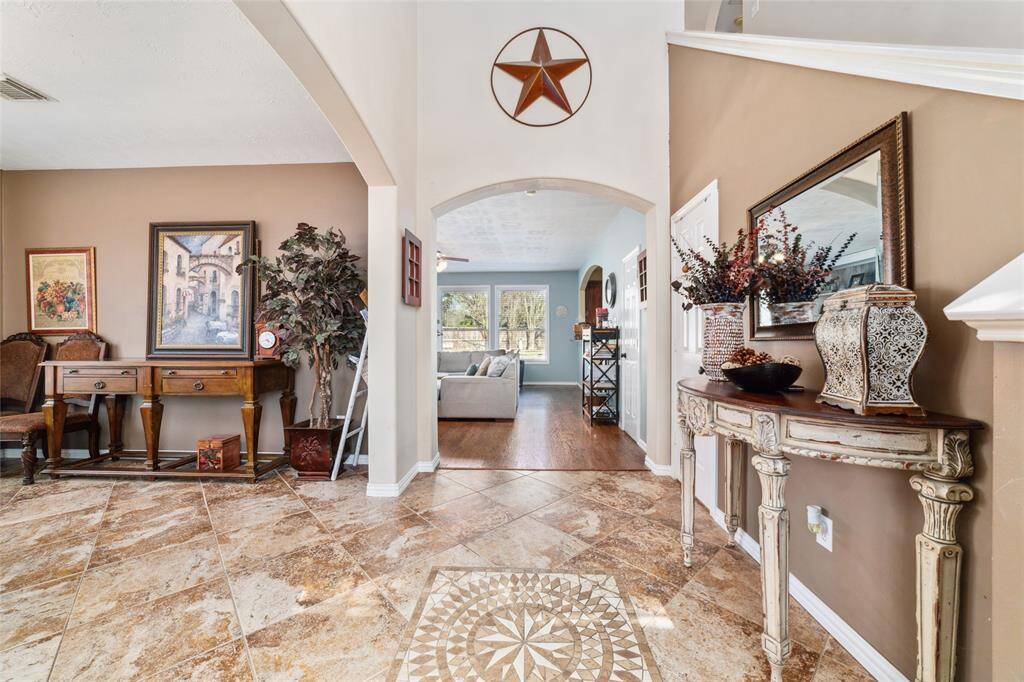 Beautiful entrance w formal dining room.