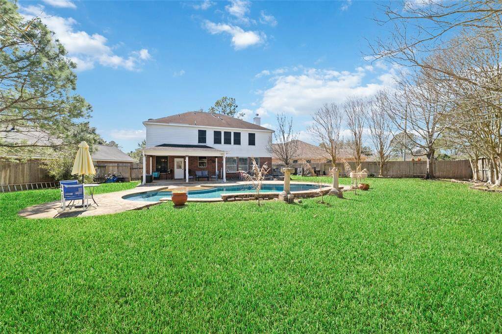 Huge back yard more than just pool space!