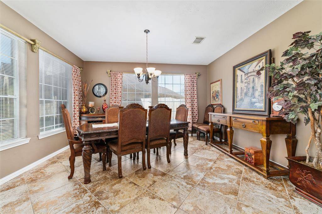 Formal dining room perfect for entertaining friends and family.