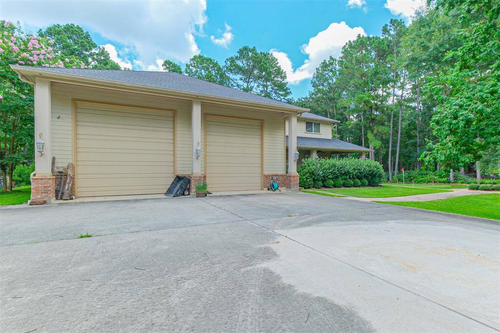 The double RV garage gives you the space you need for anything you need, be it boat storage, golf cart storage or your RV collection. Inside, there are RV hookups and a sanitary dump station leading directly to the septic system–so thoughtful! You’ll also appreciate the $13,000 worth of cabinets in the workshop