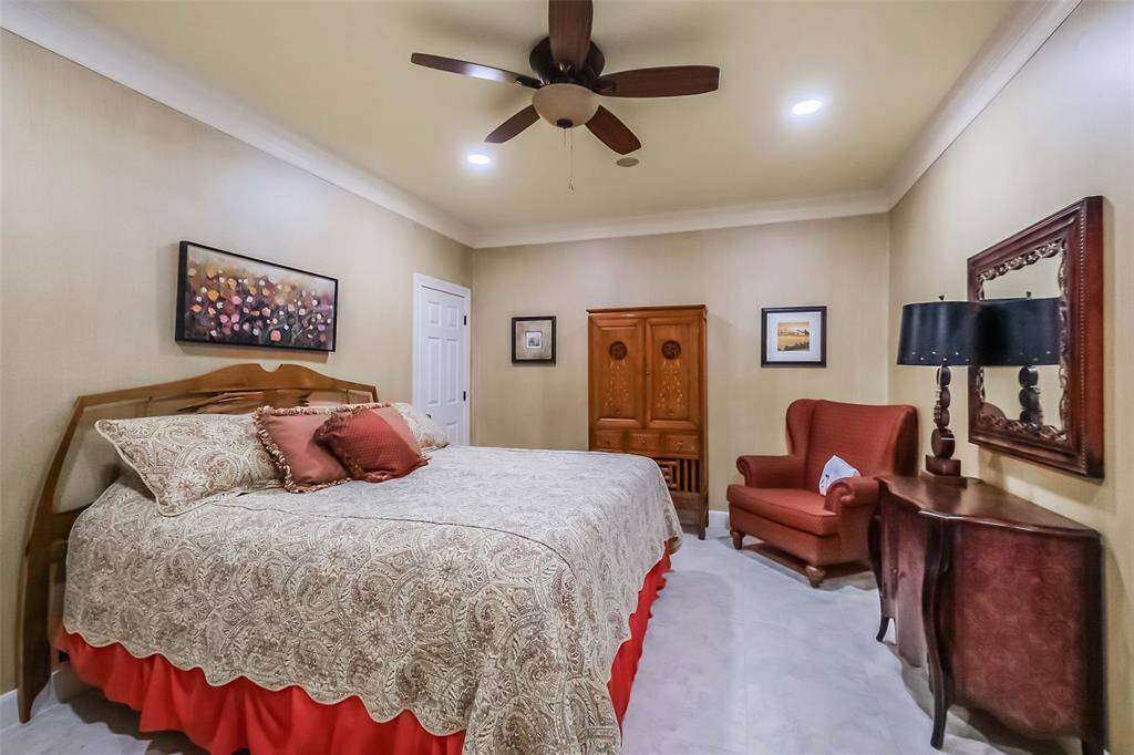 This home has two bedroom suites on the first floor! This secondary downstairs bedroom also has an attached full bathroom.