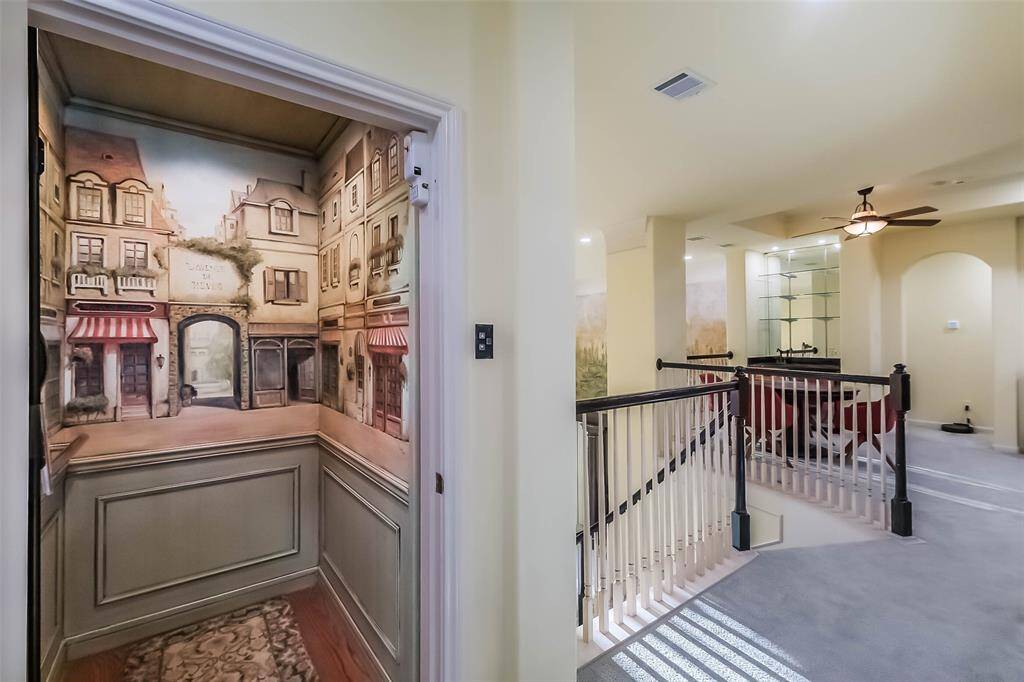 The hand painted cafe street scene inside your private elevator is such a conversation piece and makes your ride more interesting!