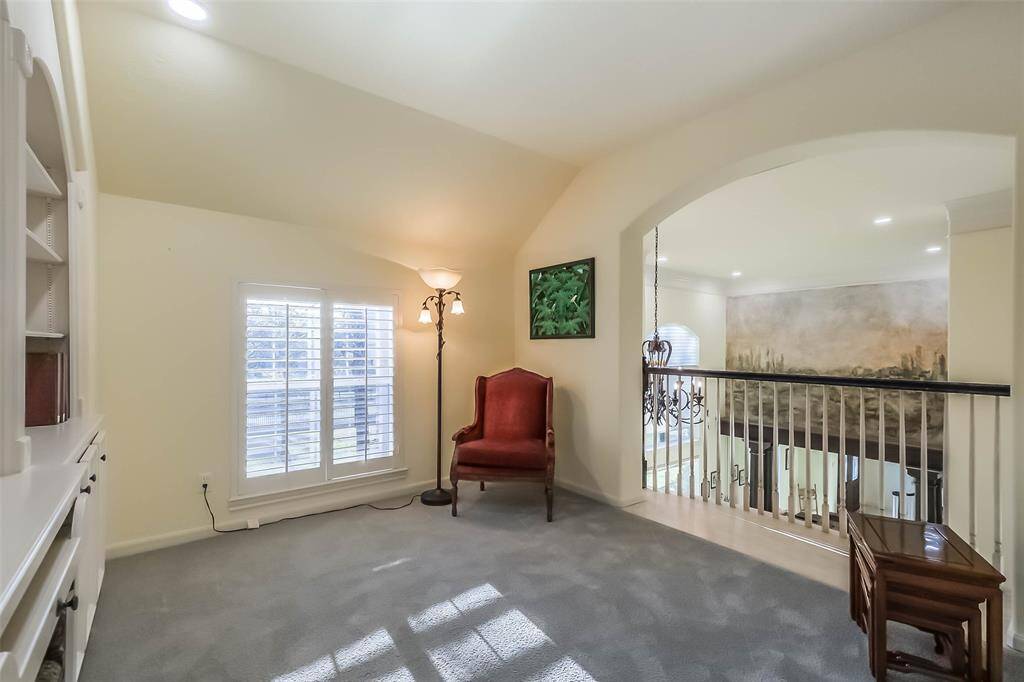 The current owners created this home library loft space above the office below. Home libraries are trending, so bring your books and your favorite reading chair to make this space your sanctuary.