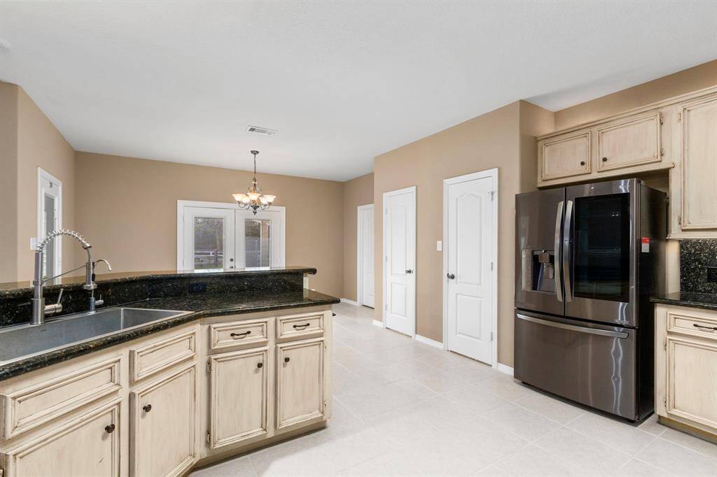Custom built in dual door additional pantry