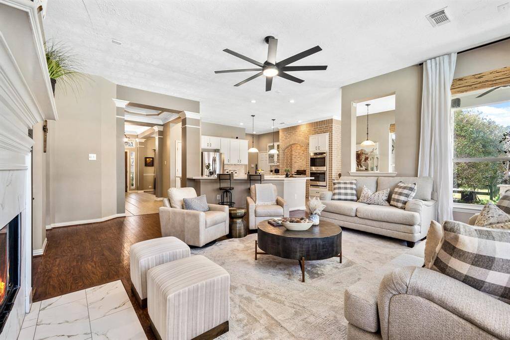 The Living Room flows seamlessly into the Kitchen and Breakfast Room, making entertaining groups both large and small a breeze.