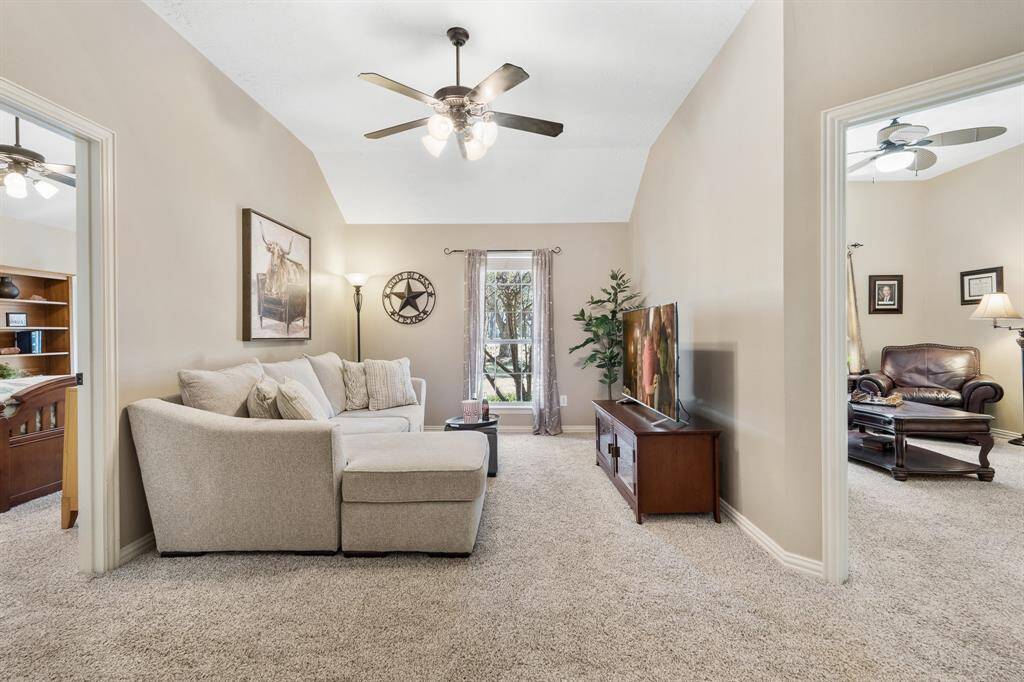 This home has a separate wing off the main living space that boasts two Secondary Bedrooms, a Game Room, and Bonus Room. This Game Room is spacious, and can easily accommodate cozy seating, desks, and/or a myriad of toys.