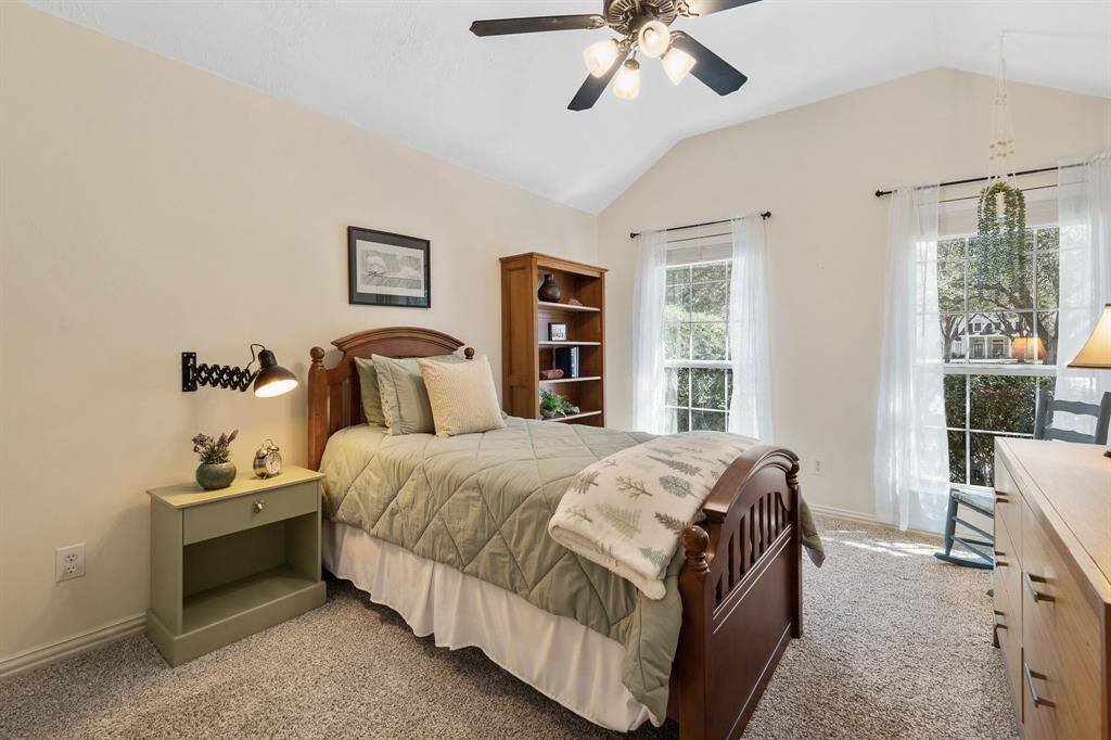 This roomy Secondary Bedroom has all the same features as the previous Bedroom, except this one possesses two large windows overlooking the Front Yard.
