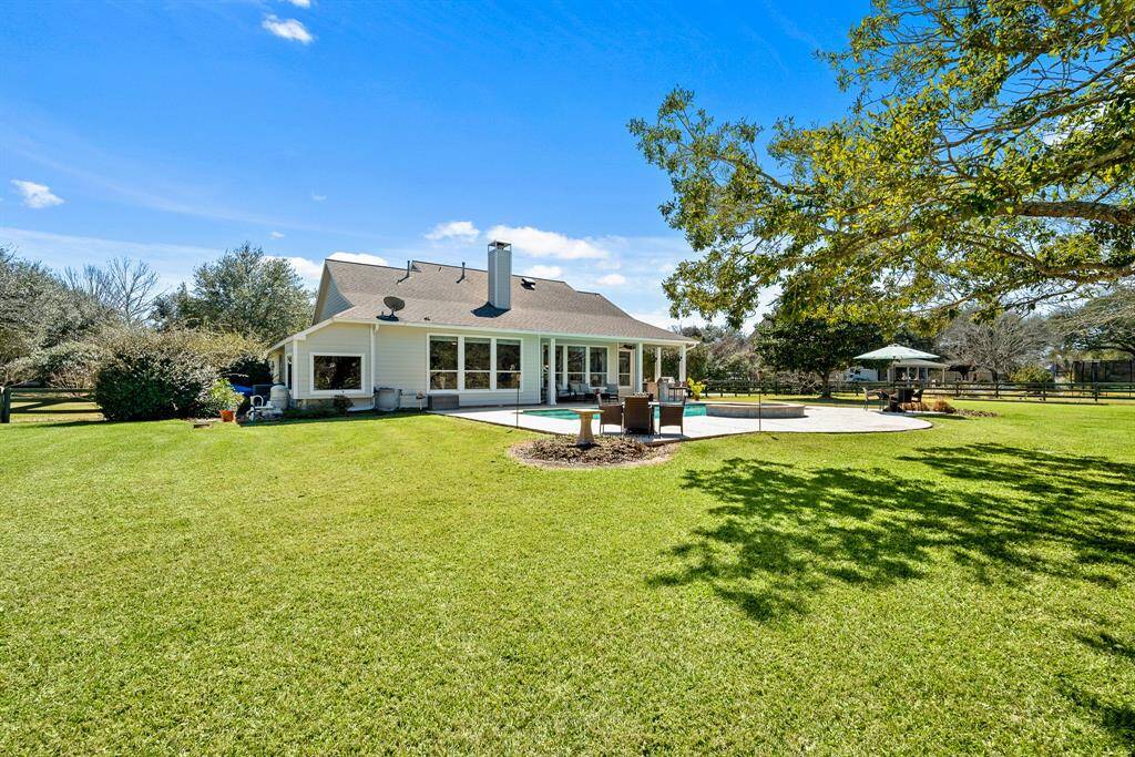 Even with such a large Pool and entertaining area, there is still ample green space for the kids to play and dogs to run.