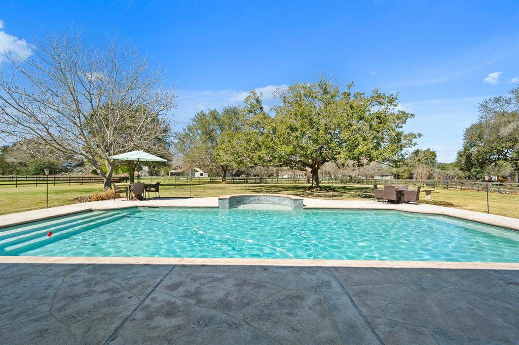 Let’s take a sneak peek at the Backyard oasis that awaits! This spacious and sparkling pool is the ideal spot to stay cool this coming summer.