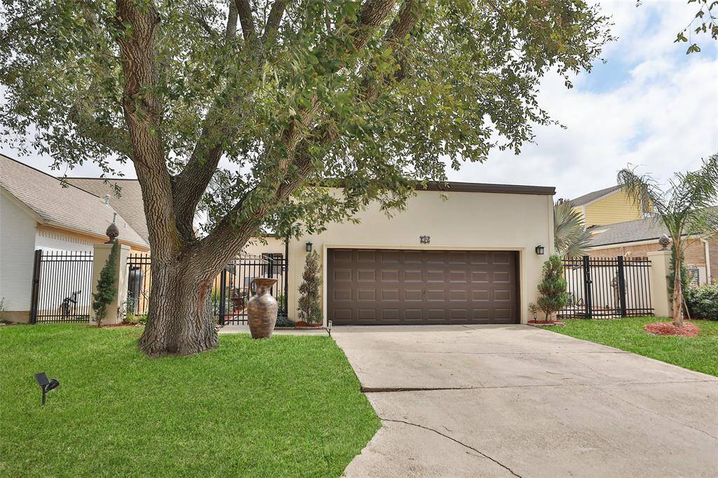 Front view of the home, new stucco.