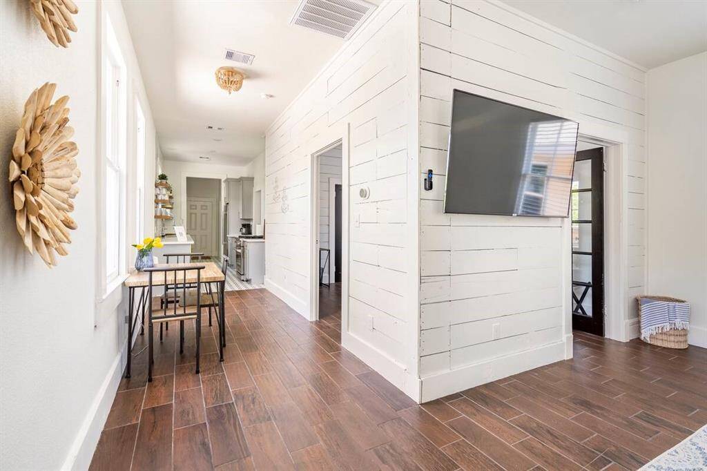 The dining room is light filled and can be multifunctional.