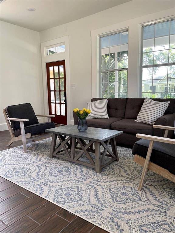 The living room is filled with natural light.