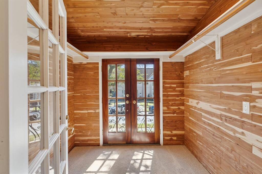 The second bedroom also has an oversized walk-in cedar-cladded closet, which measures approximately 7' x 7'. There are numerous spacious closets such as this one. Also, there are abundant storage nooks and lots of built-ins at this River Oaks residence.