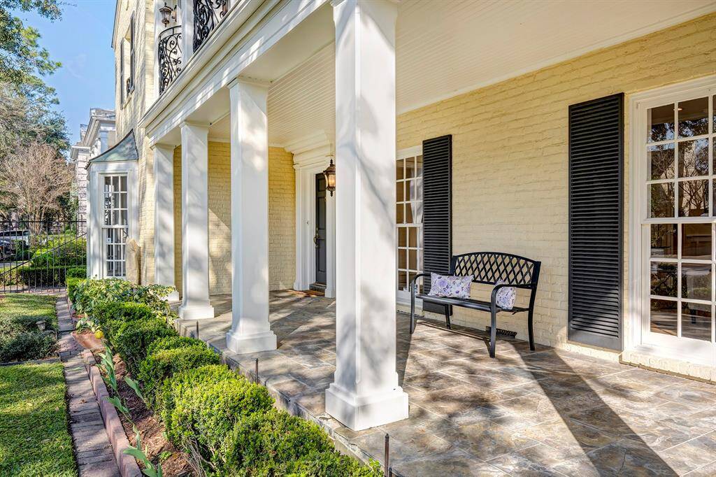 The front elevation features an expansive slate porch [30' x 8']. Enjoy your morning coffee or an afternoon lemonade under this covered space. This remarkable River Oaks residence is a short stroll to Pumpkin Park playgrounds, basketball and tennis courts on Locke Lane and Larchmont.