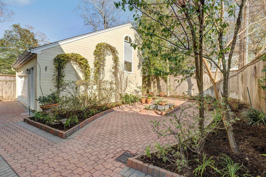The paved backyard is approximately 900 SF per recent measurement taken by a vendor specializing in synthetic turf.