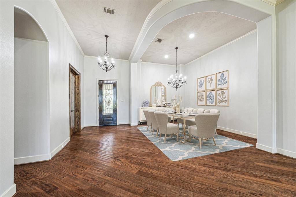 A spacious dining room near the entrance makes it easy to welcome and mingle, while the seamless connection to the family room allows for smooth flow and interaction. *Virtually Staged*