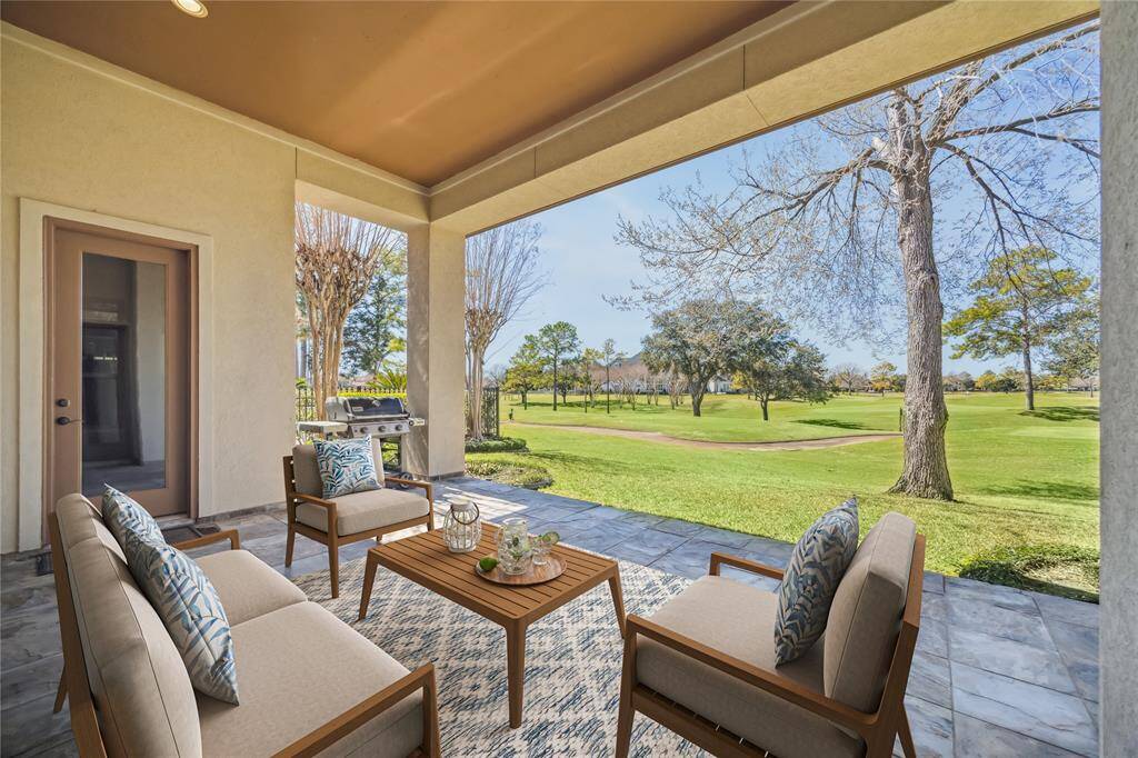 Savor your morning coffee or evening drinks with stunning golf course views and includes a gas grill for perfect outdoor entertaining. *Virtually Staged*