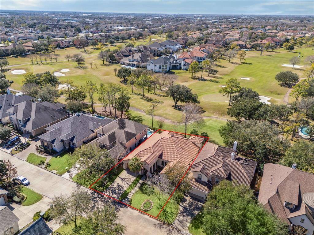 Aerial view to display this exceptional property location off the golf course.