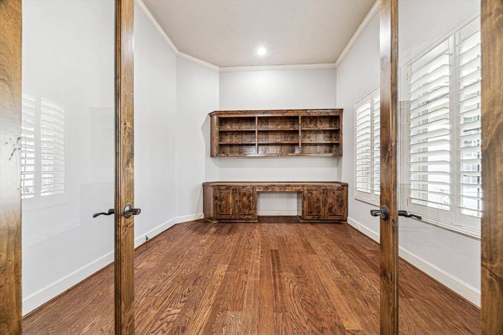 Natural light flows through the double glass doors creating a bright and inviting space while maintaining a sense of privacy.