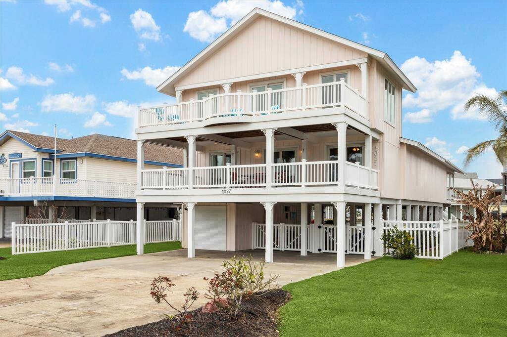 Welcome home to 4027 Nueces!  Notice two large decks on the front of the home as well as the oversized driveway for ample parking for guests and your boat!