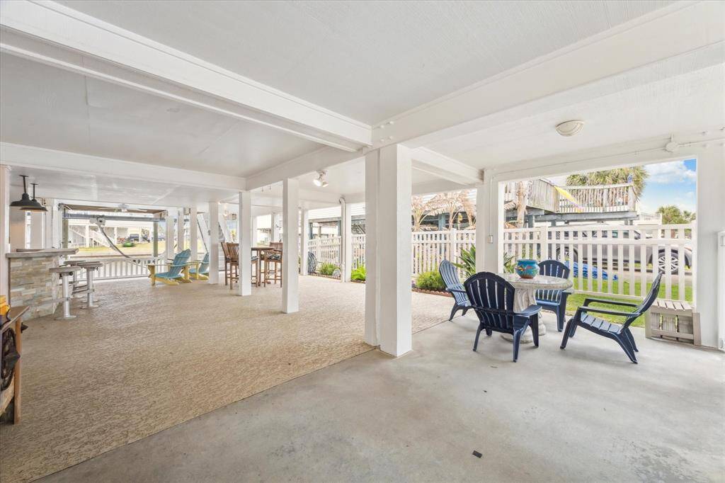 Your first welcome to the property is into the huge ground floor outdoor living area.  So many places for gathering and the non-slip surface is an ideal safety precaution.