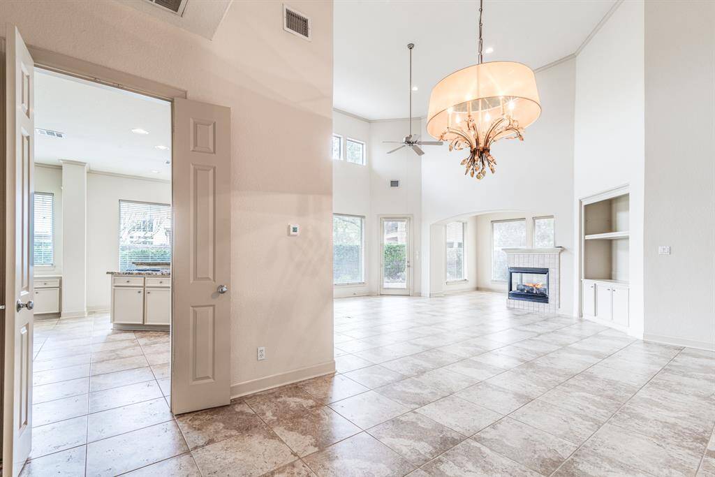 View from dining area into kitchen and living space. Fabulous open flow perfect for entertaining and functional living.