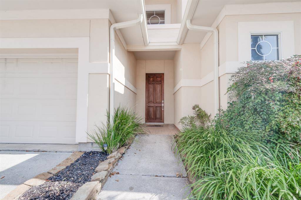Covered entryway and two car garage.